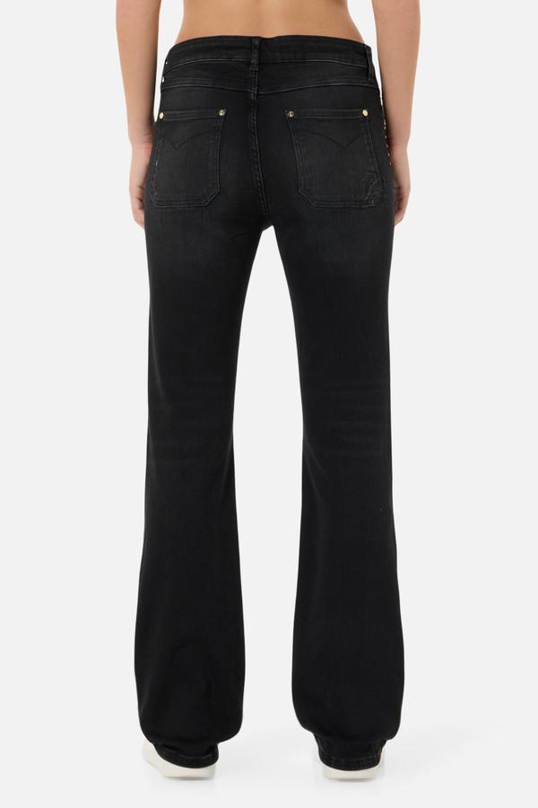 Jeans Neri A Zampa Con Borchie